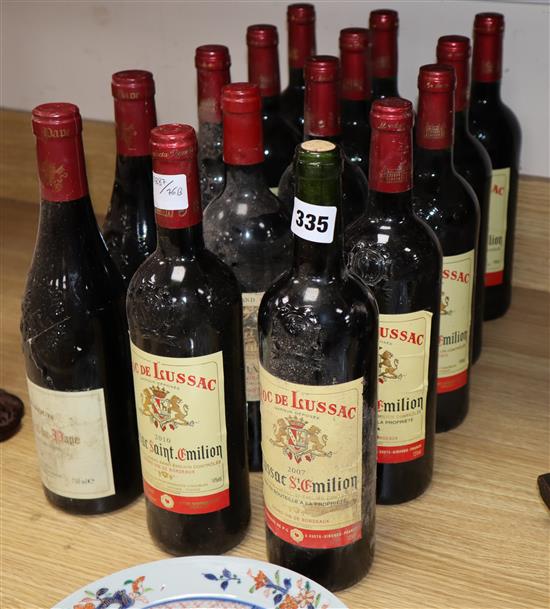 Twelve Roc de Lussac 2007 (4) and 2010 (8) and two bottle of Chateauneuf du Pape, 2010 and a 1997 Chateau Magdelaine